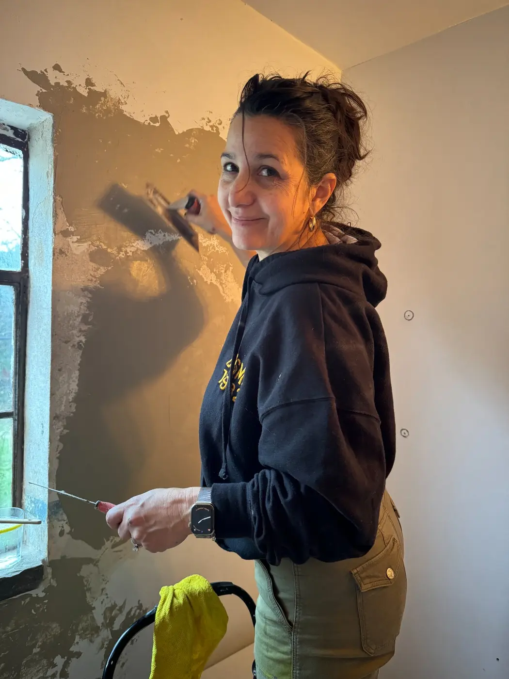 Repairing and re-plastering the original stucco archways